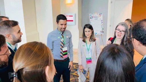 Members talking together between sessions at a chapter meeting